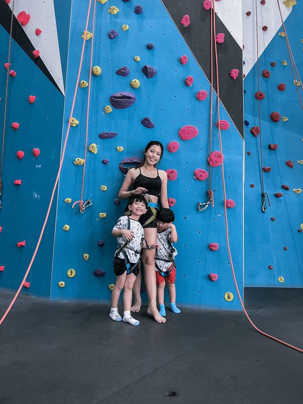 Janice rock climbing with her kids